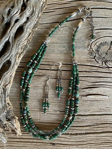 Triple strand jade necklace by Myra Gadson